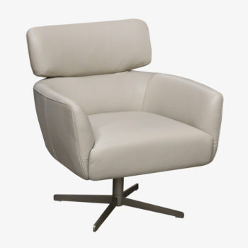 A Light Grey Leather Swivel Chair.